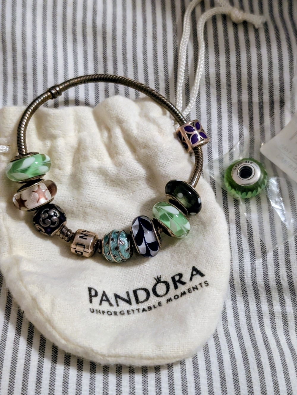 Pandora Silver Charm Bracelet with Green and Purple Accents